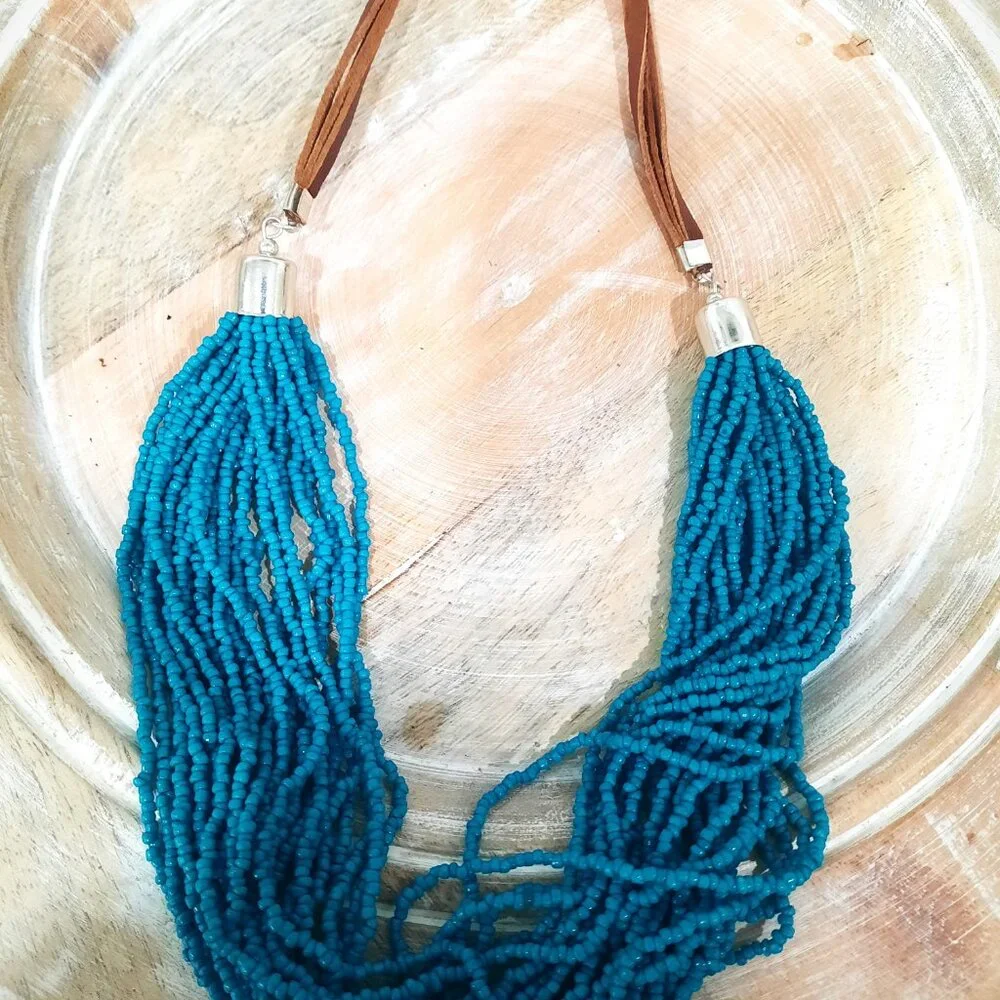 Turquoise Colored Multi Strand Beaded Statement Necklace with Leather Accent - Picture 2 of 4